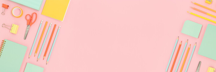 Colorful school supplies frame on a pink pastel background. Banner with stationery layout.