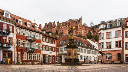 Fototapeta premium Cornmarket, ger. Kornmarkt and Statuesque of Kornmarktmadonna in Downtown of City Heidelberg, Baden-Wuerttemberg, Germany. Europe
