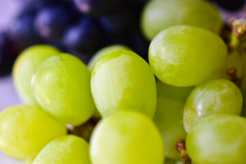 Black and green delicious fresh grapes macrophotography