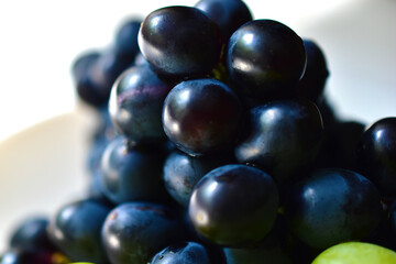 Black and green delicious fresh grapes macrophotography