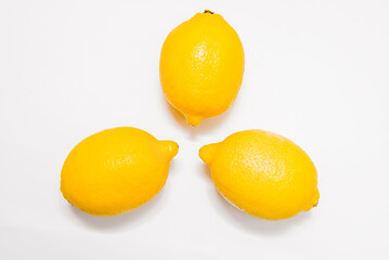 Fresh lemons isolated on white background