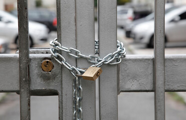 
gate locked with chain and padlock