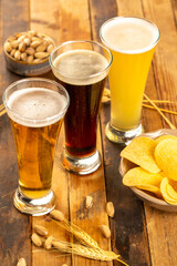 Cold beer in glasses in studio 