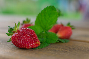 strawberries on a wooden table