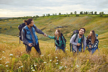 Friends hikers smiling at camping trip