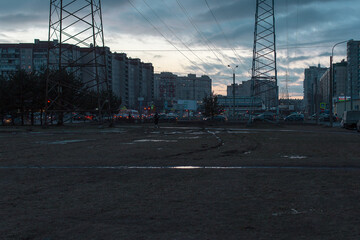 Fototapeta na wymiar Power lines in a big city in the evening