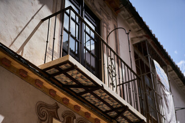 balcony of an old historical building in M&aacute;laga
