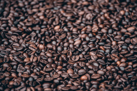 a heap of black coffee beans
