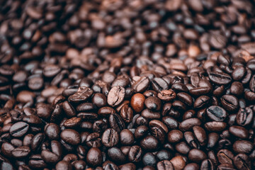 a heap of black coffee beans