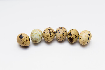 Food: group of quail eggs, isolated on white background