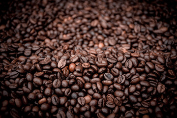 a heap of black coffee beans