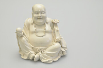Laughing white Buddha on White