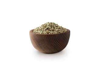 Wooden bowl with green buckwheat isolated on white background. Close-up. Green buckwheat groats Isolated on white background. Green buckwheat. Image with copy space. Superfood.