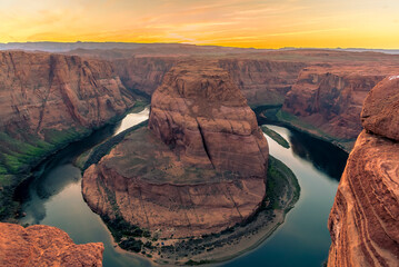 Horseshoe Bend on the Colorado River near to Page, Arizona as the sun begins to set - Powered by Adobe
