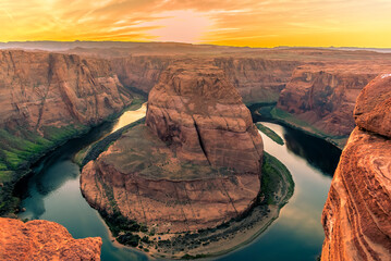 Horseshoe Bend on the Colorado River near to Page, Arizona with the sunset below the horizon