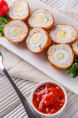 Scotch egg meat balls on rustic wooden background