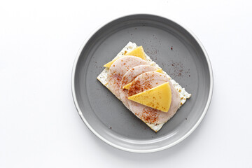 Salty crackers with sausage chicken, cheese and paprika from above