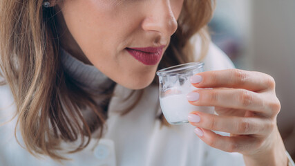 Female Pharmacist Testing Cream Scent in Laboratory