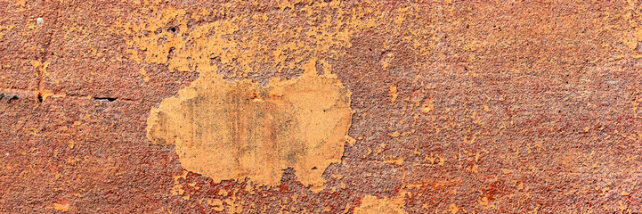 Texture of a concrete wall with cracks and scratches which can be used as a background