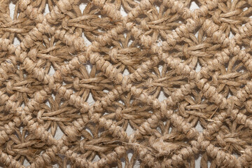 Solid background weaving rhombuses, macrame from jute rope