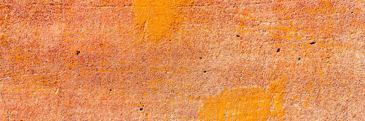 Texture of a concrete wall with cracks and scratches which can be used as a background