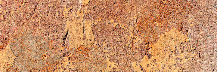Fototapeta premium Texture of a concrete wall with cracks and scratches which can be used as a background