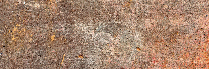 Texture of a concrete wall with cracks and scratches which can be used as a background