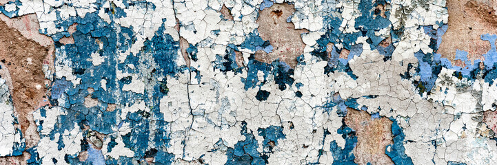 Texture of a concrete wall with cracks and scratches which can be used as a background