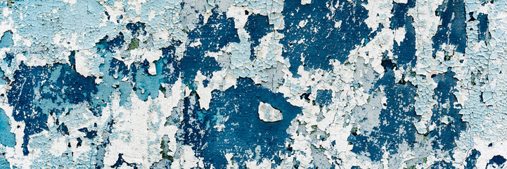 Texture of a concrete wall with cracks and scratches which can be used as a background