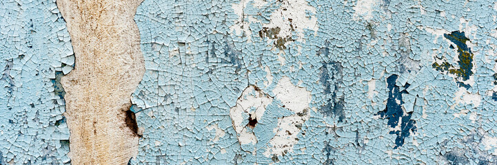 Texture of a concrete wall with cracks and scratches which can be used as a background