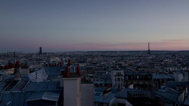 Day to night timelapse of Paris cityscape, France