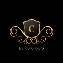 Golden Luxurious Letter C logo, elegance vector design concept shield shape with initial letter logo icon for luxury business identity.