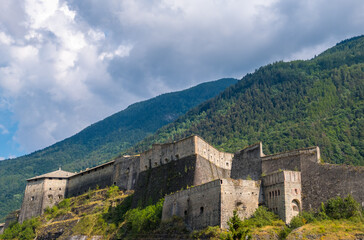 Fototapeta premium Exilles, Italy - August 21, 2019: The Exilles Fort is a fortified complex in the Susa Valley, Metropolitan City of Turin, Piedmont, northern Italy
