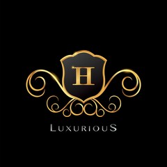 Golden Luxurious Letter H logo, elegance vector design concept shield shape with initial letter logo icon for luxury business identity.