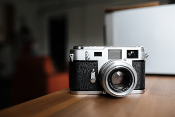 Vintage film camera on a white background. Horizontal.