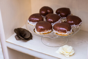 chocolate cake with icing and sprinkles