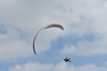 Paragliding at the beach of Katwijk aan Zee. Paraglider's making use of updraft of the dunes to stay in the air