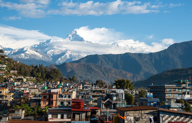 Fototapeta na wymiar The cityscape of Pokhara with the Annapurna mountain range Nepal, Asia