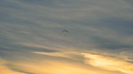 paraglider on a beautiful dawn sky
