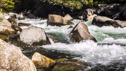 Mountain valley creek full of rocks in Sierra Nevada, California