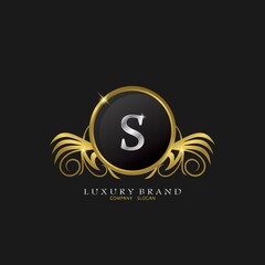 Obraz premium Letter S Golden Circle Shield Luxury Brand Logo, vector design concept for initial, luxury business, hotel, wedding service, boutique, decoration and more brands.