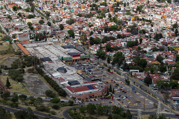 Aerial view of a shopping center in San Mateo, Naucalpan, Mexico beside living area and equestrian center