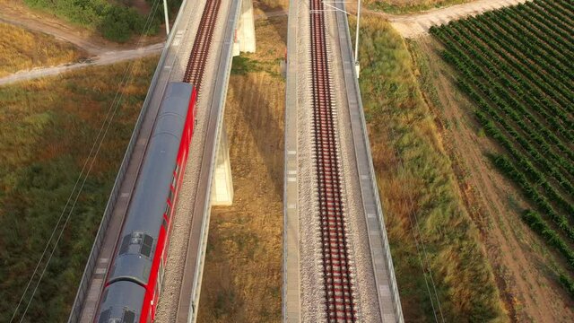 Modern Passengers train riding on Bridge &ndash; Aerial top down view
Modiin/ Israel/ June,22, 2020
