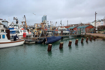 Fototapeta na wymiar Portsmouth marina view by cloudy noon, England
