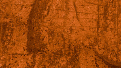 Copper orange background with old brown vintage grunge texture; abstract rough wall design with grungy paint spatter, autumn or halloween color background design