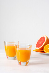 Grapefruit and orange juice, summer refreshing citrus drink