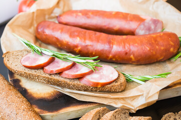 Sausage. Rye Baguette with Sausage and Rosemary.
