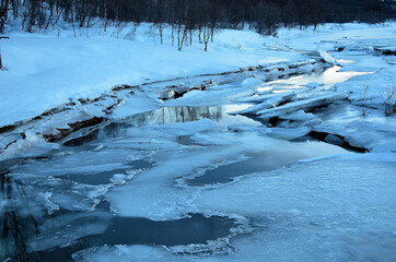 Fototapeta premium frozen river stream in winter