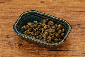 Tasty capers in the bowl