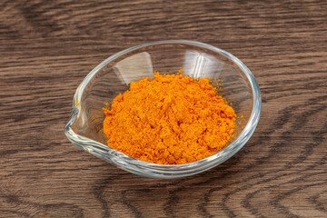 Tumeric powder in the bowl